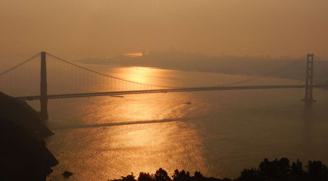 This photo taken from Hawk Hill on 9 October 2017 shows smog from the Northern California wildfires hanging over San Francisco and the Golden Gate Bridge. Photo: Michael Hanrahan