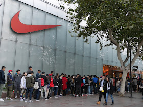 line of people outside a Nike store in Shanghai