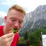 eating pizza in Grindelwald, Switzerland in Grindelwald, Switzerland 