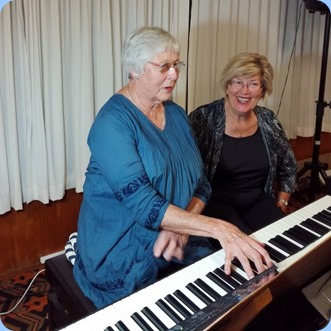 Claudette Wheeler played a mixture of classics and light music for us. Kay Boyes seen here turning the pages. Photo courtesy of Dennis Lyons.