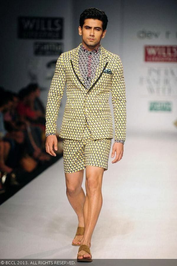 A model showcases a creation by fashion designers Dev r Nil on Day 3 of Wills Lifestyle India Fashion Week (WIFW) Spring/Summer 2014, held in Delhi.