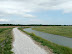 New stone surface laid on the river defences