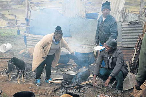 CREATIVE COOK: Siphokazi checking on a pot of meat Pictures: SUPPLIED