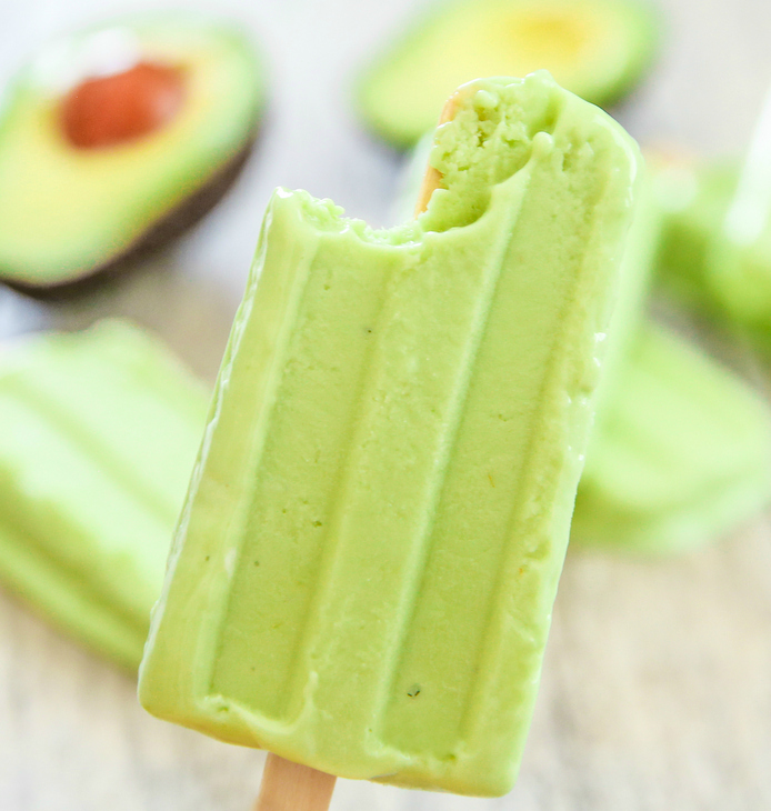 close-up photo of one Avocado Ice Pop with a bite taken out of it