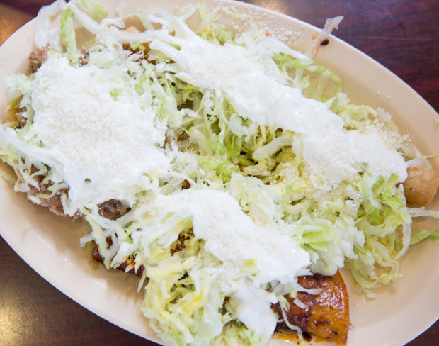 overhead photo of Enchilada, Rolled Taco, Sope Combination