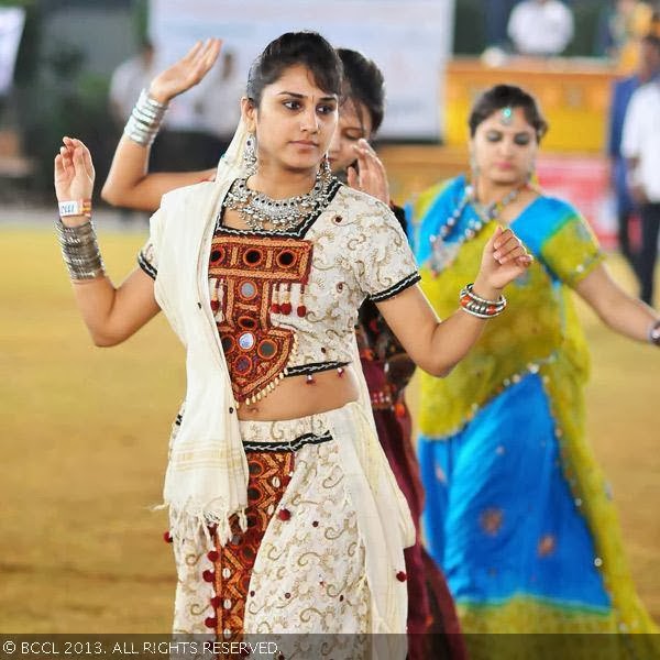 Rakhi plays garba during the Dandiya Dance night organised by Nandhari at SS Function Hall in Hyderabad.