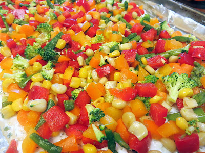 Summer Appetizer Recipe: Chilled Vegetable Pizza with dill/chive cream cheese mixture and broccoli, asparagus, baby carrots, red and orange bell peppers, corn kernels!