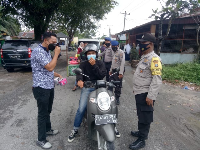 Team Gempur Covid-19 Polsek Tanjung Beringin Gelar Ops Yustisi