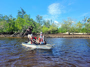 Passing local fishermen on the Pomene Nature Reserve mangrove tour.