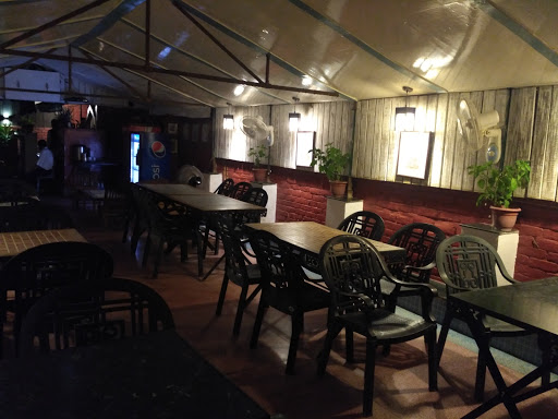 Raja Cafe, near hotel siddhartha, Opposite of western group of temples, Sevagram, Khajuraho, Madhya Pradesh 471606, India, Western_Restaurant, state MP