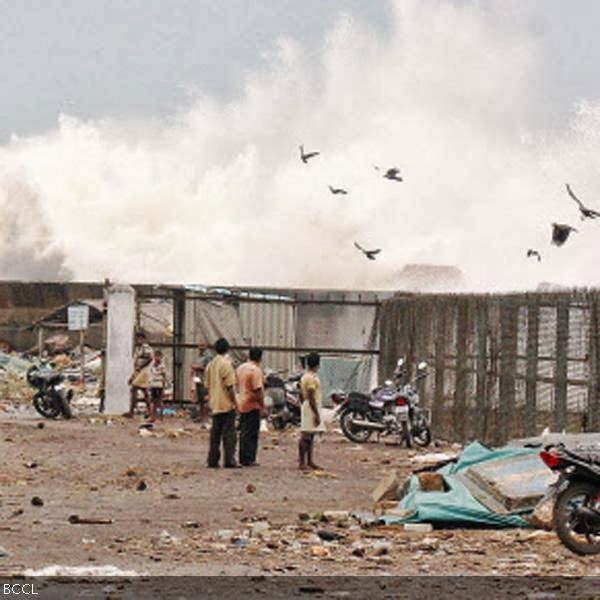 Water splashes across the walls of the Fishing Harbour caused by Cyclone Phailin in Visakhapatnam on Saturday. 