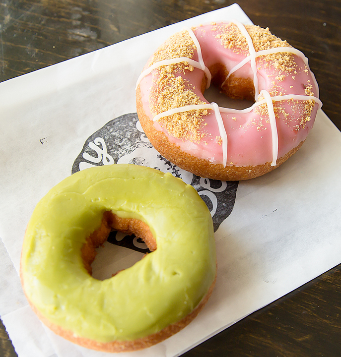 overhead photo of two vegan donuts