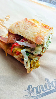 Lardo Chefwich #5 of 2014, a collaboration with Sarah Schafer of Irving St Kitchen. Fried chicken, tasso bacon, padron pepper relish, buttermilk slaw, cajun mayo. Proceeds benefit Share Our Strength to fight childhood hunger. Until mid April 2014 only.