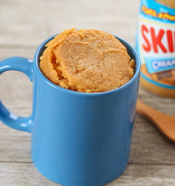 peanut butter cake in a blue mug