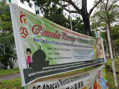 A banner advertising the Ramadhan porridge distribution event.