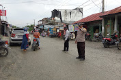 Ramai Aktivitas Masyarakat, Babinkantimas Bersama Dishub Laksanakan Giat Pengaturan dan Pam Fasilitas Umum