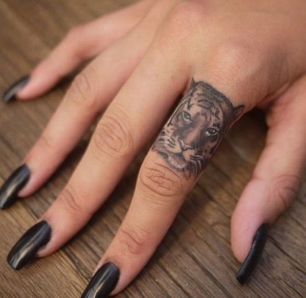 tigre_dedo_tatuagem tigre_dedo_tatuagem