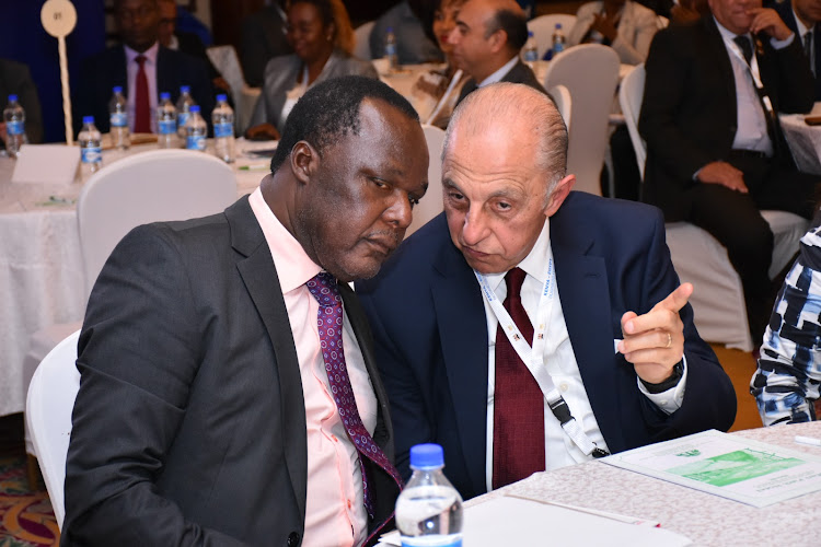 Principal Secretary, State Department of Industrialisation Juma Mukhwana and CIB Bank Kenya Independent Board Director, Essam El Wakil, during the Kenya-Egypt Business Forum in Nairobi.