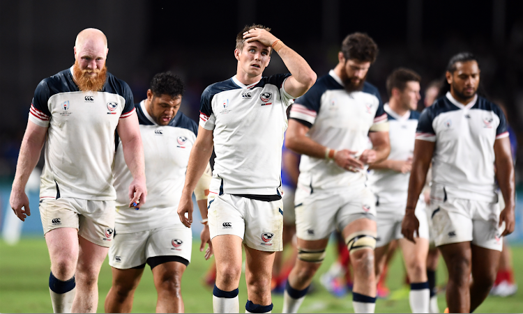 U.S. players look dejected after their defeat to France