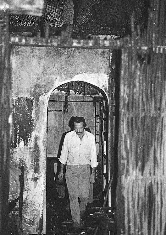 Going through the remains of the African Heritage Gallery after it was destroyed by one of the largest fires in the history of the CBD in 1976