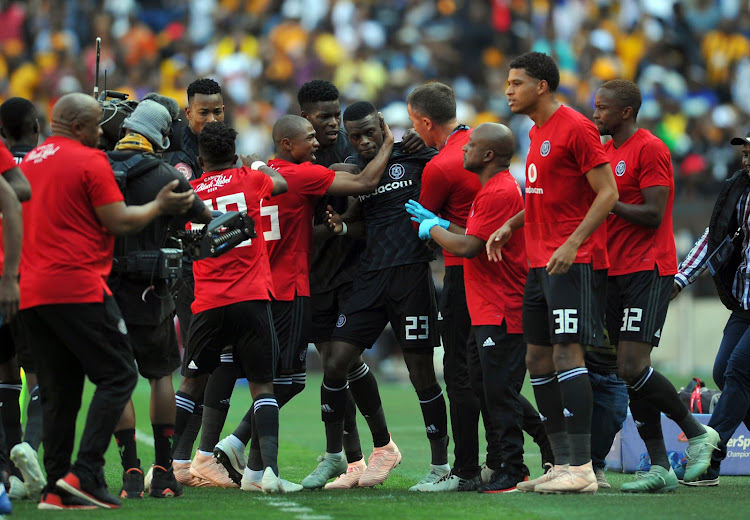 Innocent Maela of Orlando Piratescelebrates goal with teammates during the Absa Premiership match between Orlando Pirates and Kaizer Chiefs on the 27 October 2018 at FNB Stadium, Soweto.