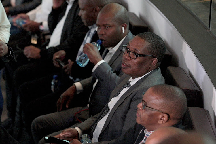 The ANC's Lebogang Maile, Panyaza Lesufi and secretary-general Ace Magashule seated in the gallery ahead of a vote in council to elect a new mayor for Johannesburg.