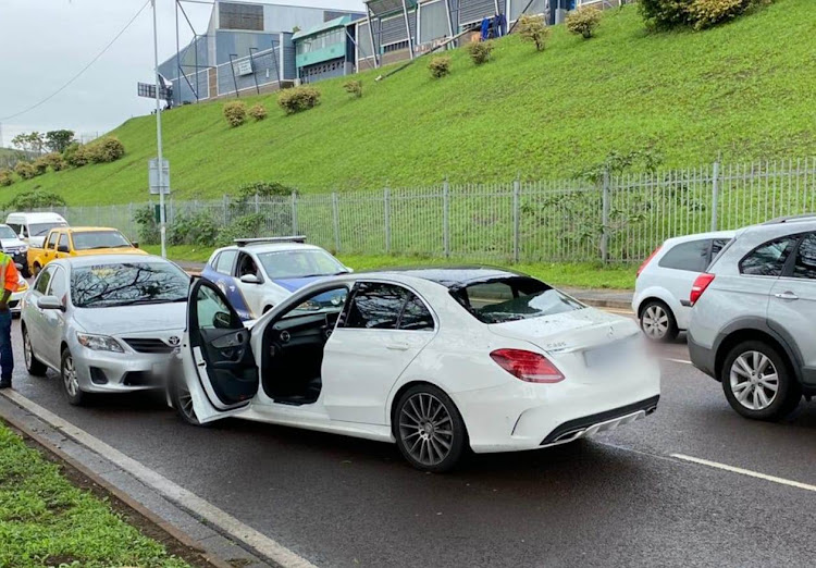 Armed men crashed the Mercedes-Benz they had allegedly hijacked in Durban on Thursday morning before firing shots at police and security officers.