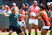 The Blitzboks coach Neil Powell takes his player through their paces.