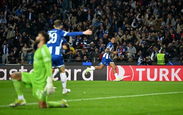 Galeno celebrates scoring FC Porto's last-gasp winner In their Uefa Champions League last 16 first leg match against Arsenal at Estadio do Dragao in Porto, Portugal on Wednesday.