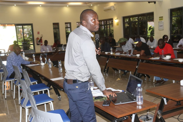 An official makes a point during the training.