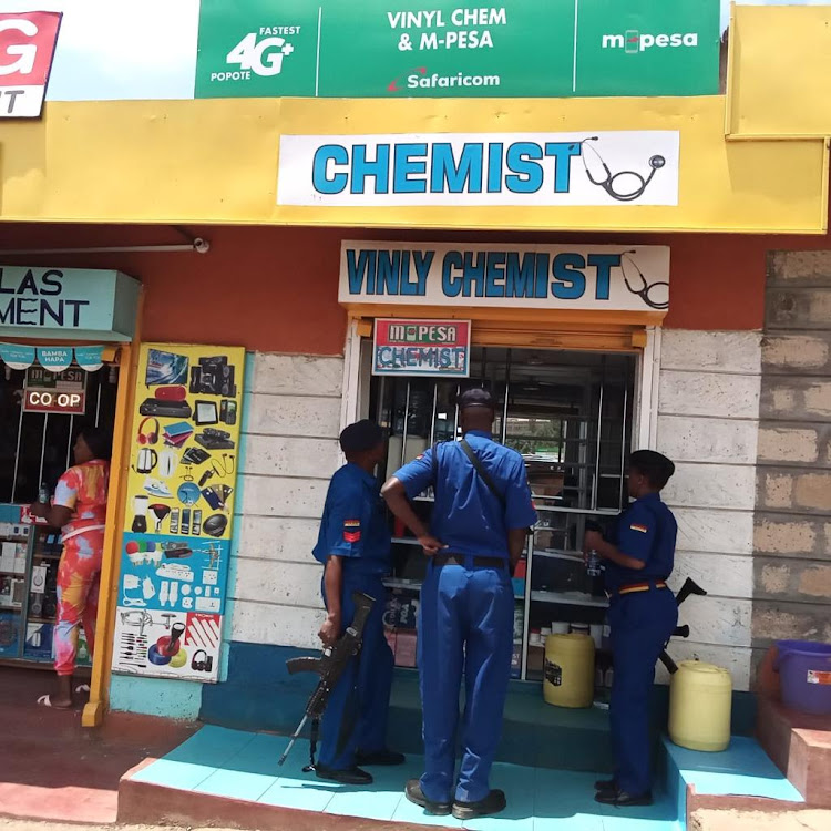 Police supervise the closure of an illegal pharmacy outlet in a joint crackdown with the Pharmacy and Poisons Board in Western and Nairobi on Saturday, March 19, 2022.