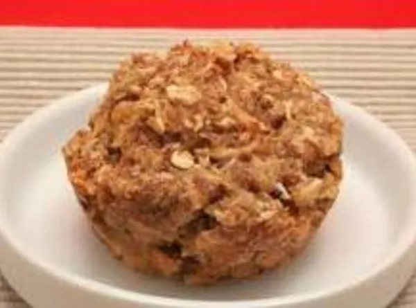 blurry image of a muffin, oatmeal and pineapple