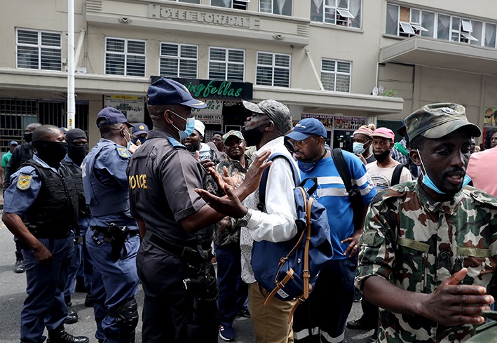 MKMVA members and truck drivers engage with police as they march down the streets of Durban's CBD on Monday amid a heavy security presence.