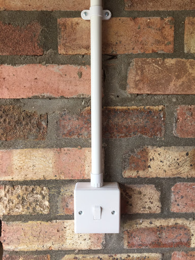 Garage lighting installed in 20mm conduit to guarantee protection of cable