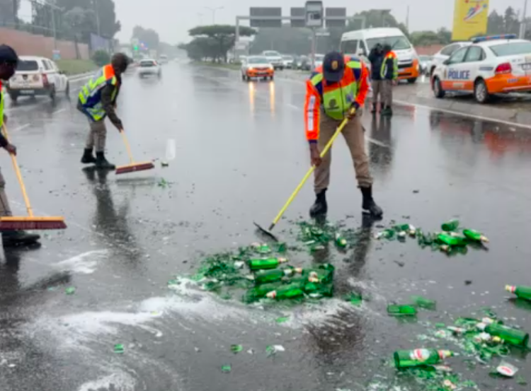 An Amstel truck lost its load due to the rain on William Nicol Drive in Fourways, Gauteng.