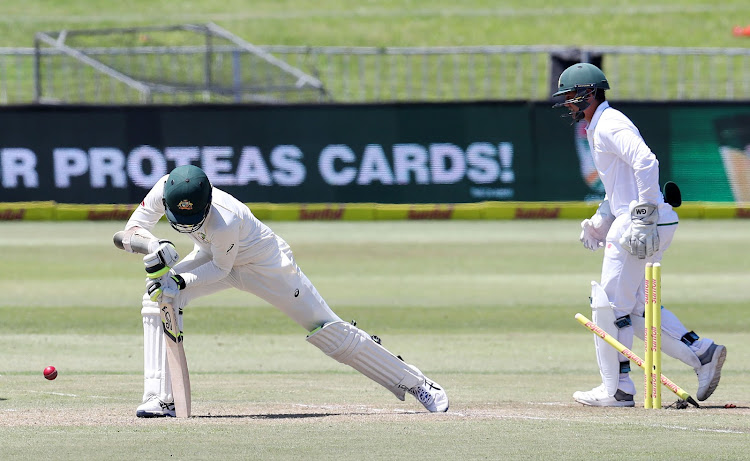 Mitchell Starc is bowled out by Keshav Maharaj during the Sunfoil Test Series match between South Africa and Australia at Sahara Kings Park Stadium, Durban South Africa on the 02 March 2018.