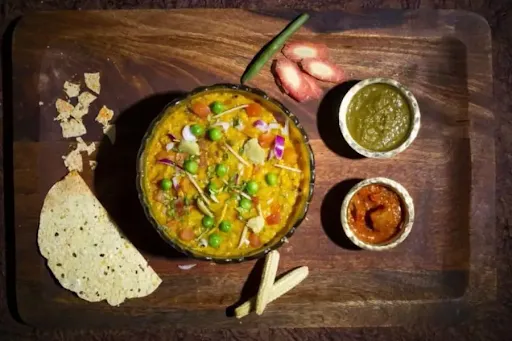 Masala Veggie Khichdi Served With Achaar And Papad