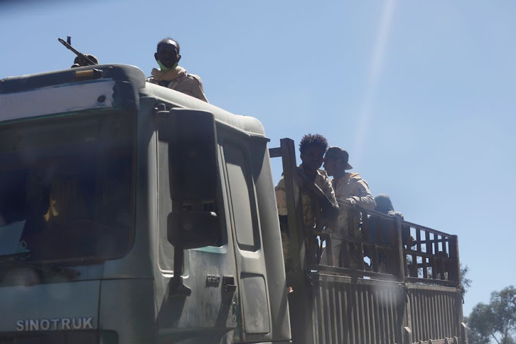 Troops in Eritrean uniforms are seen on top of a truck near the town of Adigrat, Ethiopia, March 14, 2021.2021.REUTERS/Baz Ratner/File Photo