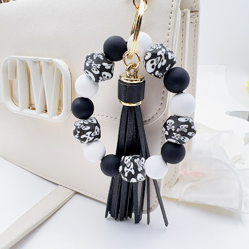 Title 3, Silicone Octagonal Oak Tassel Key Chain — styli...