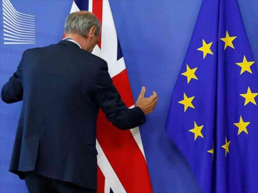 Flags are arranged at the EU headquarters as Britain and the EU launch Brexit talks in Brussels, June 19, 2017. REUTERS