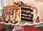 Cheesecake-Stuffed Dark Chocolate Cake was pinched from <a href="http://www.myrecipes.com/recipe/cheesecake-stuffed-dark-chocolate-cake-10000001923498/" target="_blank">www.myrecipes.com.</a>