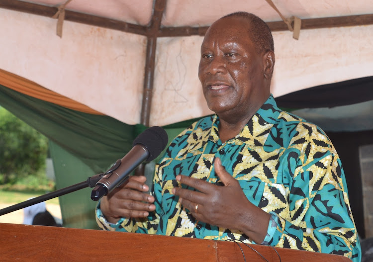 Kitui Governor Julius Malombe speaking during the ceremony on Friday at which Community Health Promoters In Mwingi North sub county were issued with bicycles to ease mobility.