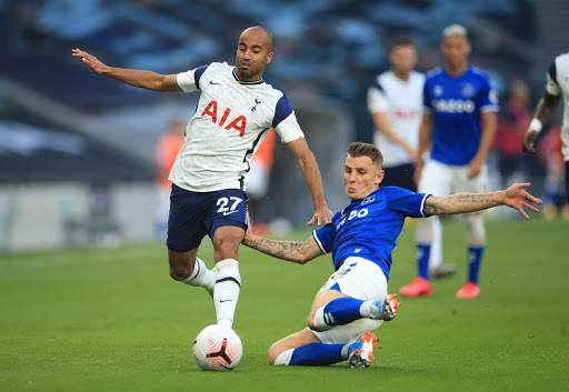 Lucas Moura (L) in action with Everton's Lucas Digne.