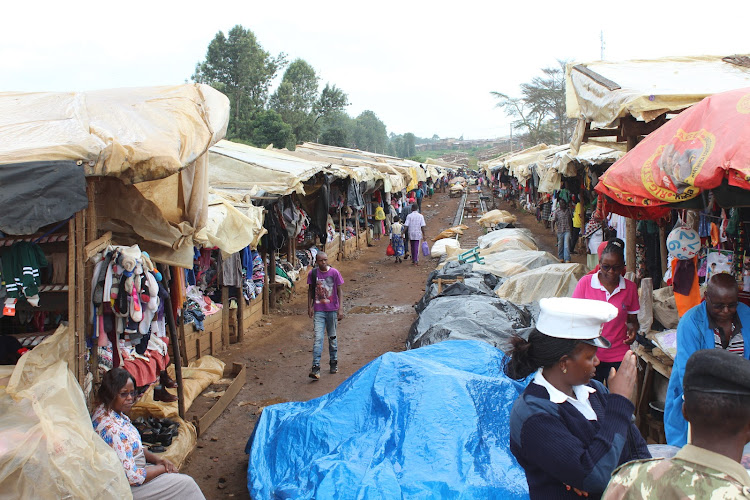 Traders at the railway line in Karatina town in Nyeri on Saturday