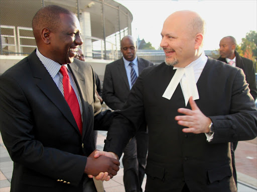 Deputy President William Ruto and his lawyer Karim Khan arrive at The International Criminal Court in October 2013. Photo/DPPS