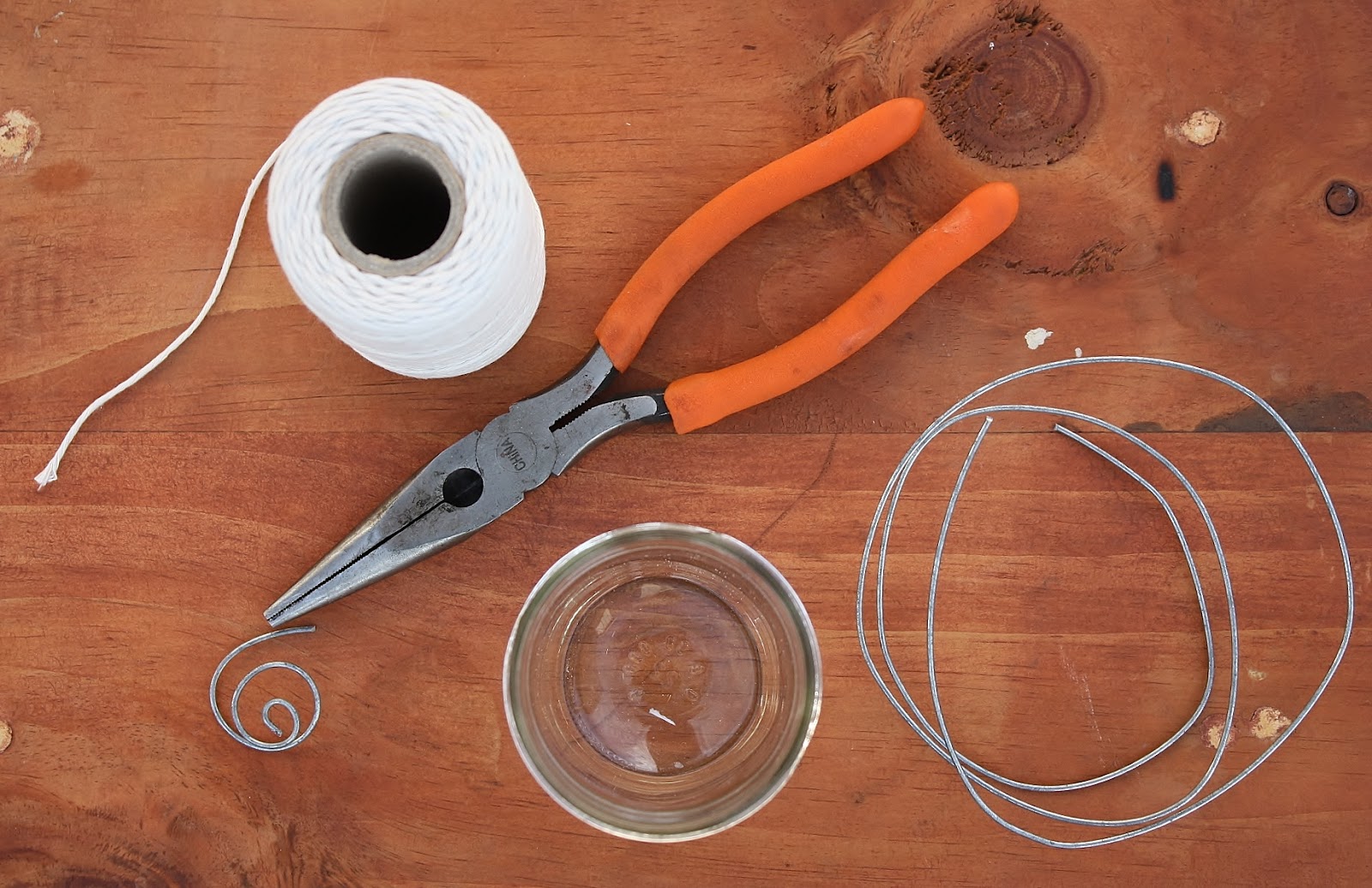 Here's a really quick and simple way to make a floating-wick oil