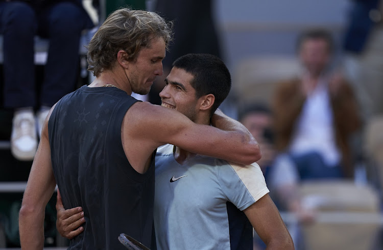 Carlos Alcaraz of Spain congratulates Alexander Zverev of Germany after their French Open quarterfinal at Roland Garros on May 31 2022.