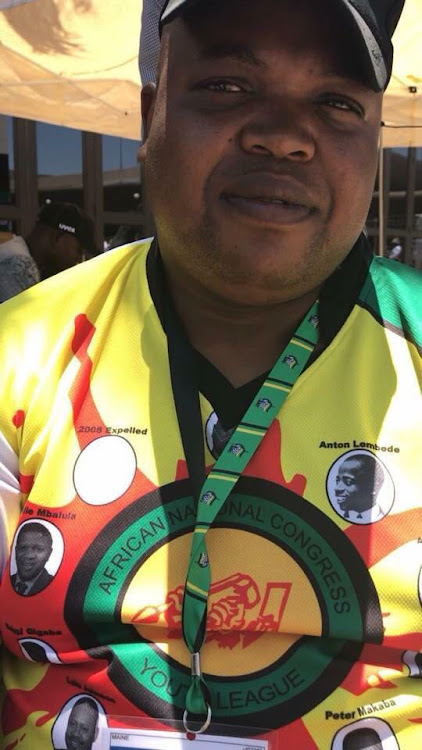 ANC Youth League President Collen Maine wearing t-shirt depicting all the previous leaders of the ANCYL. The t-shirt omits Julius Malema.