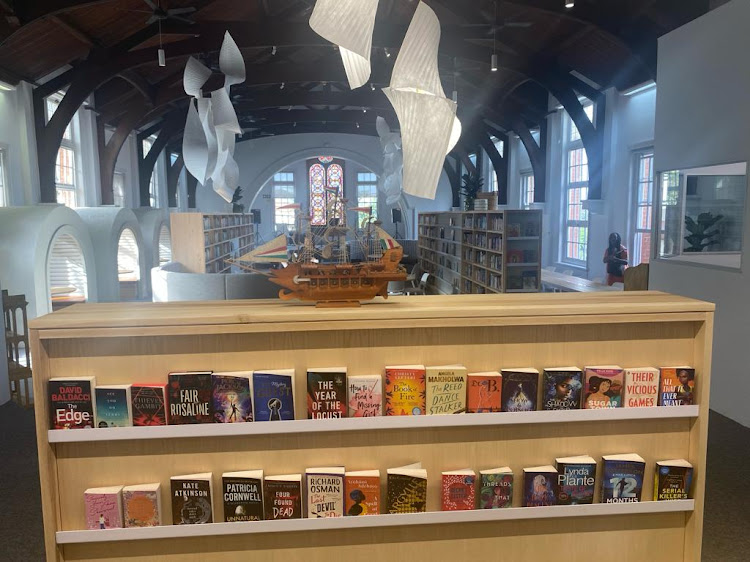 Books line the shelves of the new Anele Tembe Library.