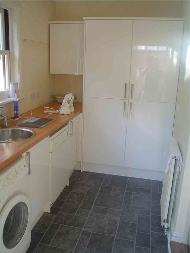 rip out old units and supply and fit new units, worktop and floor